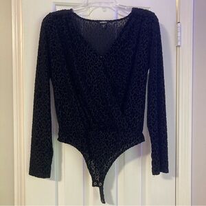 Express black leopard print v-neck body suit. Size medium. Sheer.